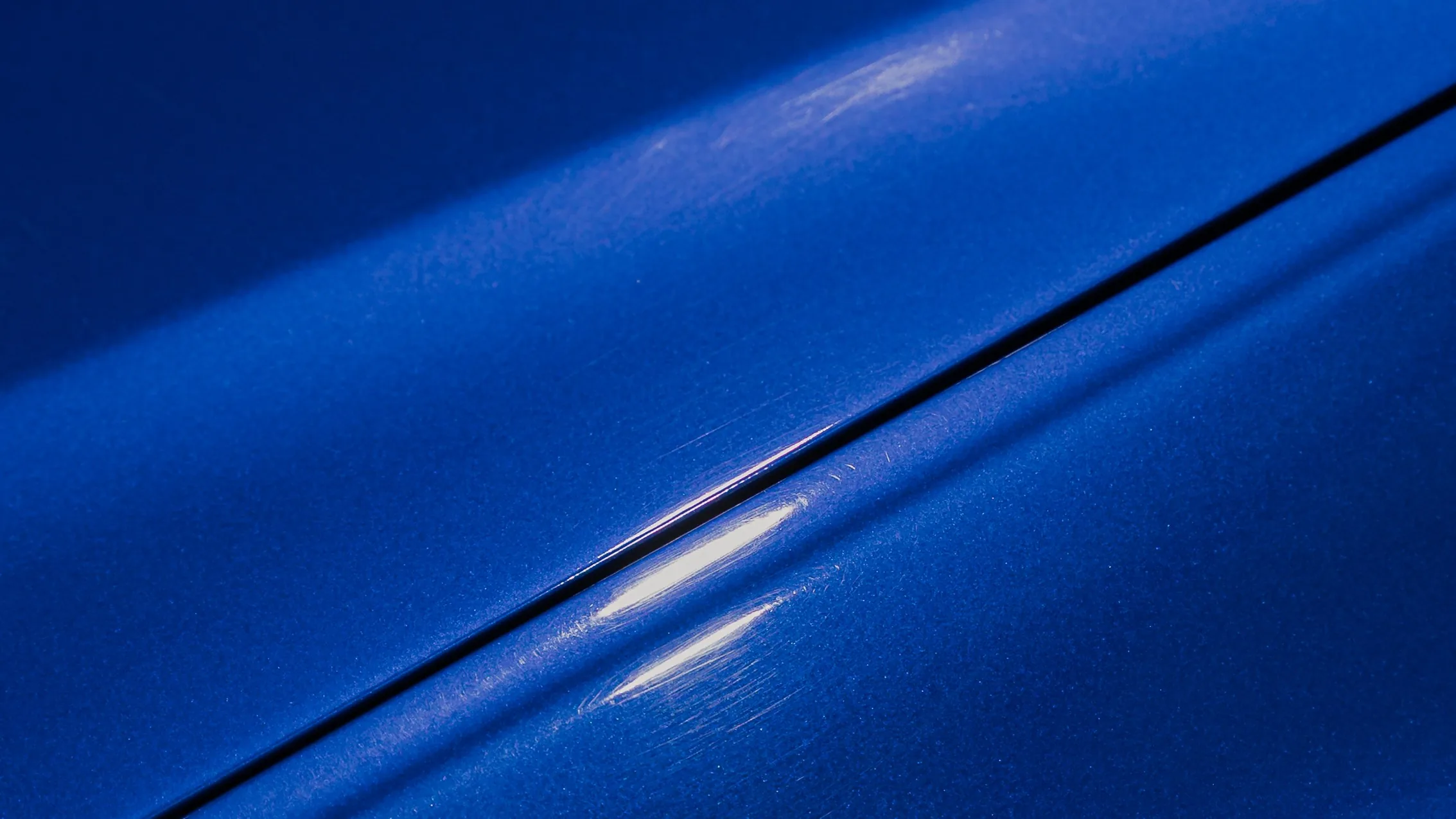 Paint before correction — swirl marks and dull finish